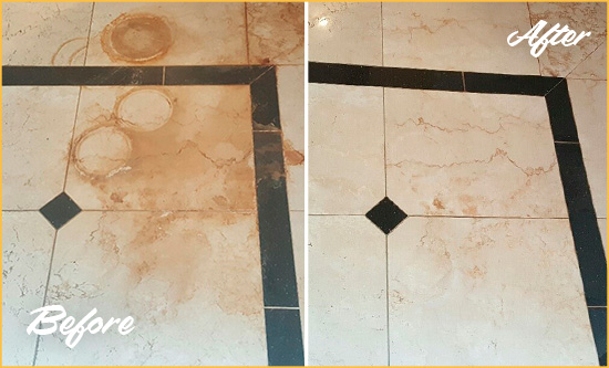 Before and After Picture of a Schiller Park Hard Surface Restoration Service on a Marble Floor to Eliminate Rust Stains